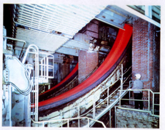 Red-hot strand emerging from the continuous caster