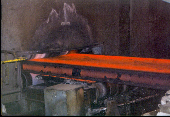 Hot strand exiting the spray chamber